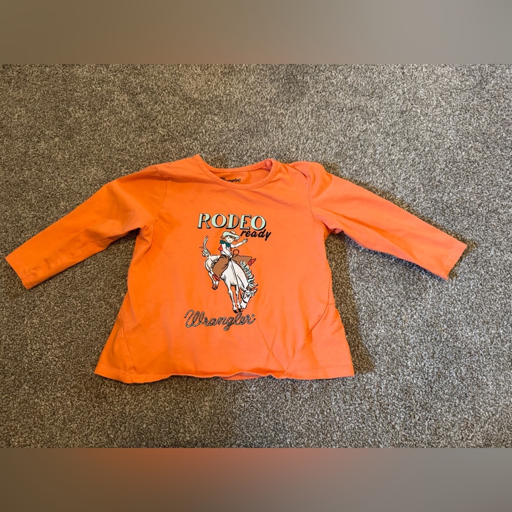 Wrangler “Rodeo Ready” cowgirl orange long sleeve t shirt ruffle back hem 2T